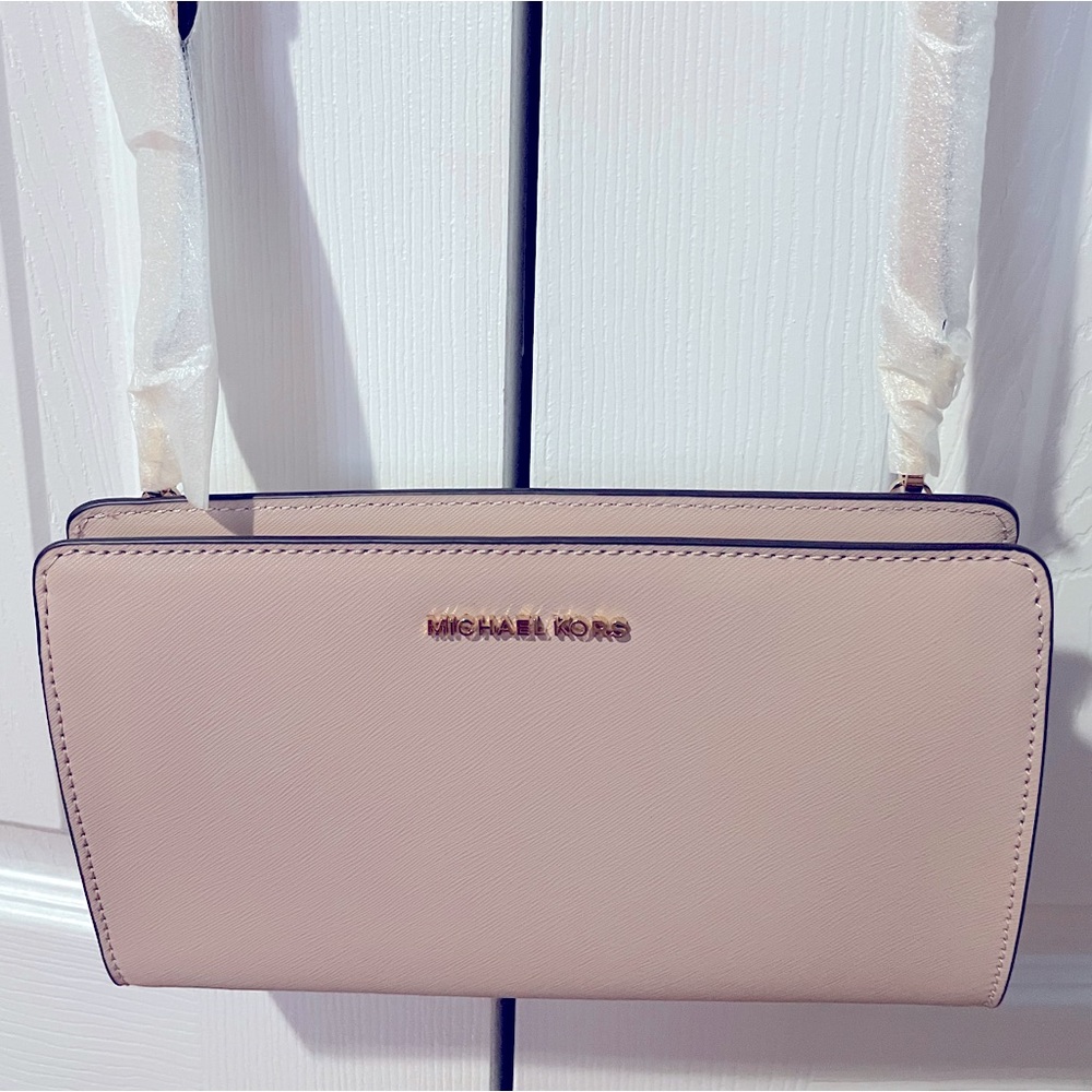 Michael Kors light pink crossbody bag